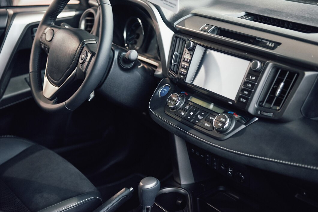 Luxury car interior with ambient lighting, premium leather seats, digital display, and custom accessories installed by Premium Car Hub