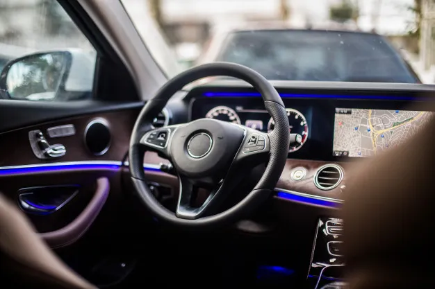 Luxury vehicle equipped with premium car accessories including ambient lighting, digital display, wireless CarPlay, premium audio system, and leather interior in Dubai
